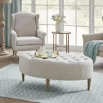tufted coffee table and upholstered chairs