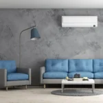 gray marble print backdrop behind blue sofas