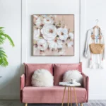 round fur pillows on loveseat and wall painting